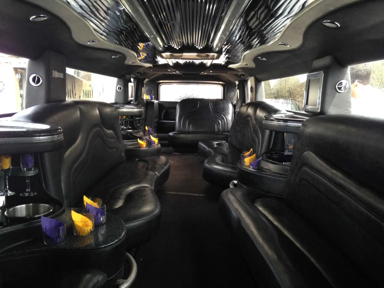 Hummer H2 Limousine - Elizabeth Taylor interior with perimeter lounge seating for limo rental Hummer H2 Limousine - Elizabeth Taylor interior with perimeter lounge seating for limo rental