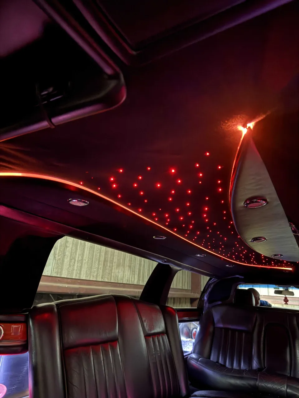 Lincoln Town car Stretch Limousine interior with starlight or fiber-optic ceiling for limo rental Lincoln Town car Stretch Limousine interior with starlight or fiber-optic ceiling for limo rental
